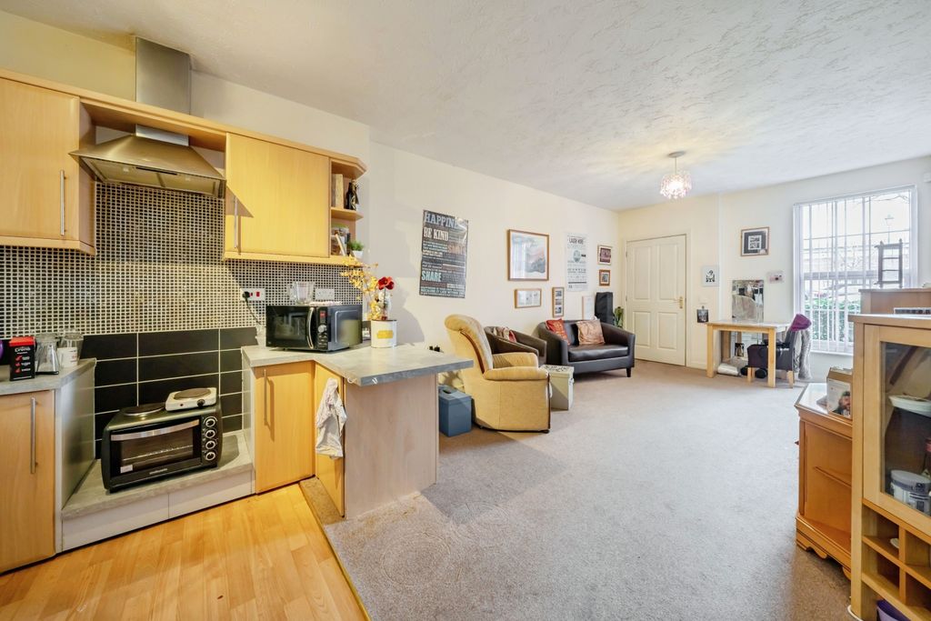 Property photo 2 of 14 2. Kitchen: Living Room