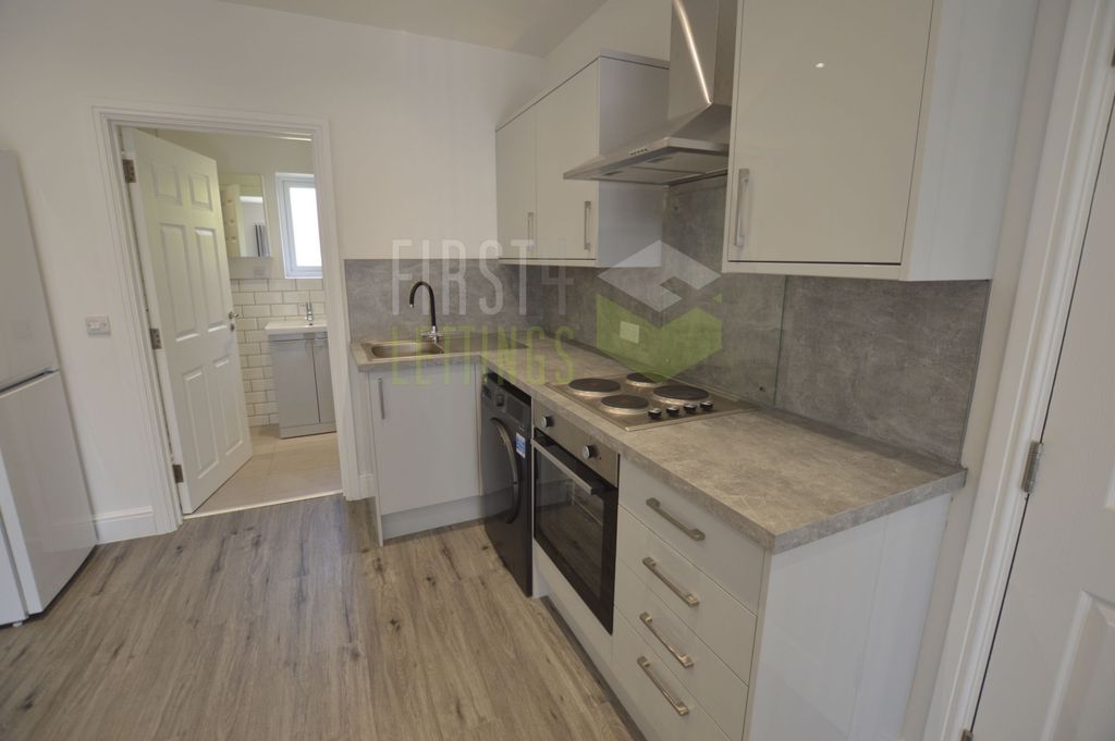 Property photo 1 of 4 Kitchen Area