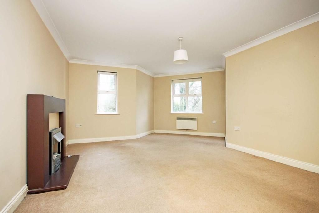 Property photo 3 of 6 Spacious And Bright Living Area With Fireplace....