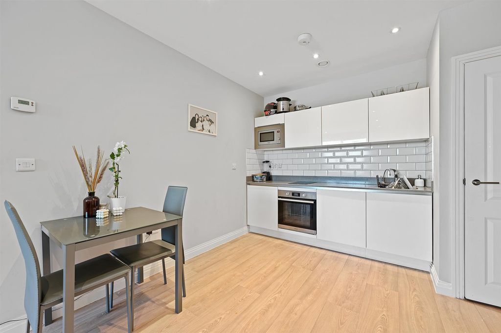 Property photo 2 of 6 Kitchen Dining Area.Jpg