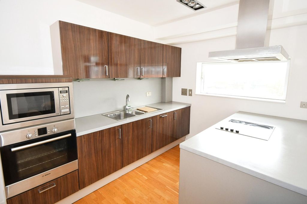 Property photo 3 of 8 Kitchen