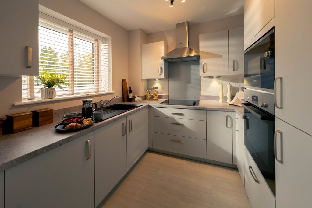 Property photo 2 of 9 Typical Kitchen