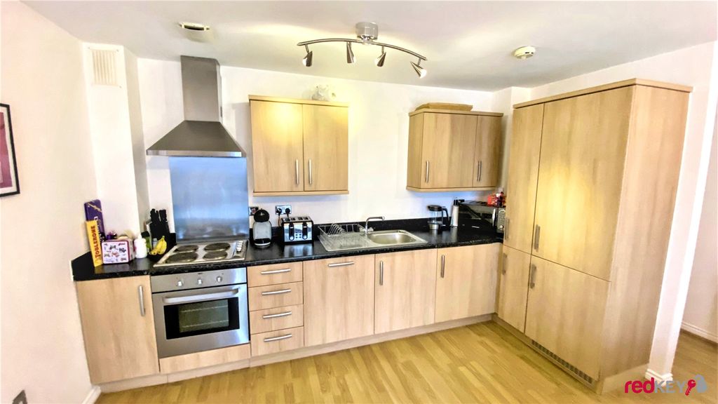 Property photo 3 of 11 Kitchen