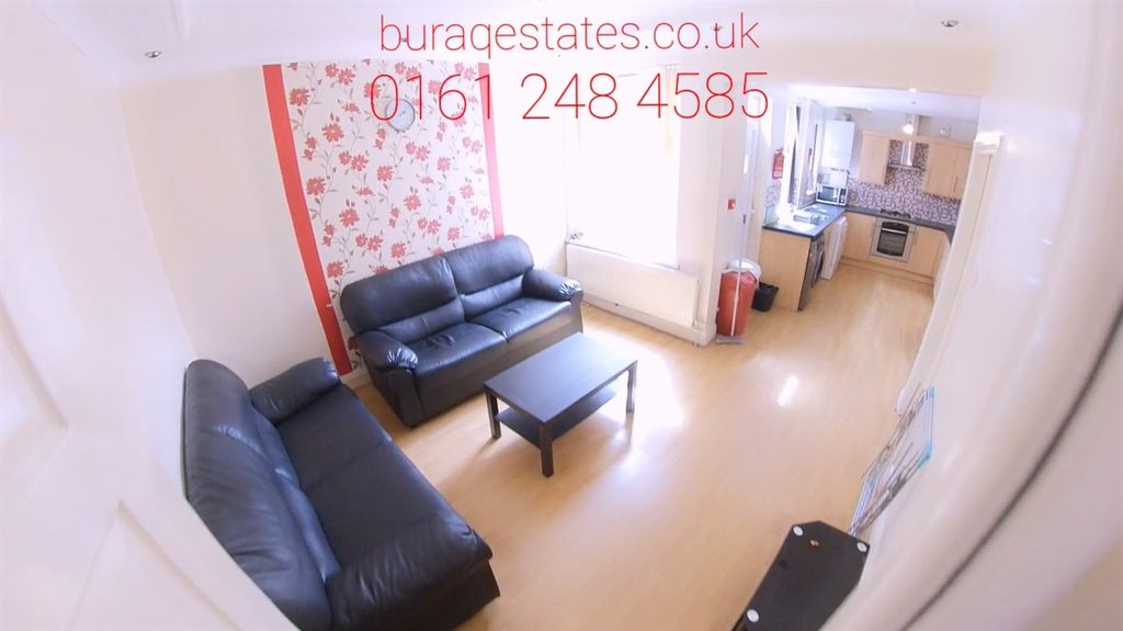 Property photo 1 of 12 Bright, Modern Living Room With Two Black Sofas, A...