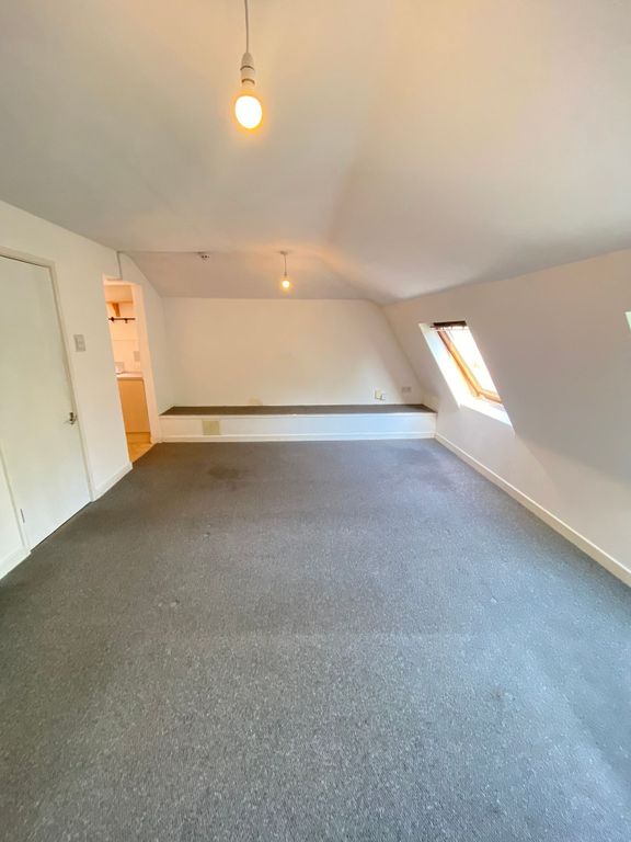 Property photo 3 of 8 A Spacious Living Room With Neutral Walls And Carp...