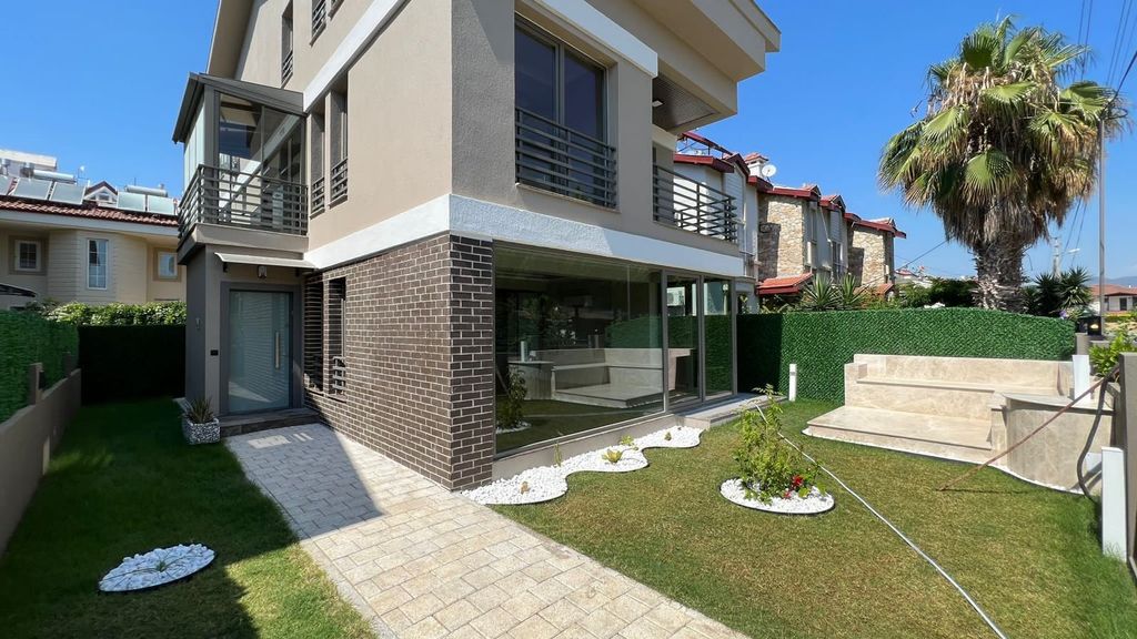 Property photo 2 of 21 A Spacious Semi-Detached Triplex Villa For Sale In Fethiye - Private Garden And Marble Seating Area