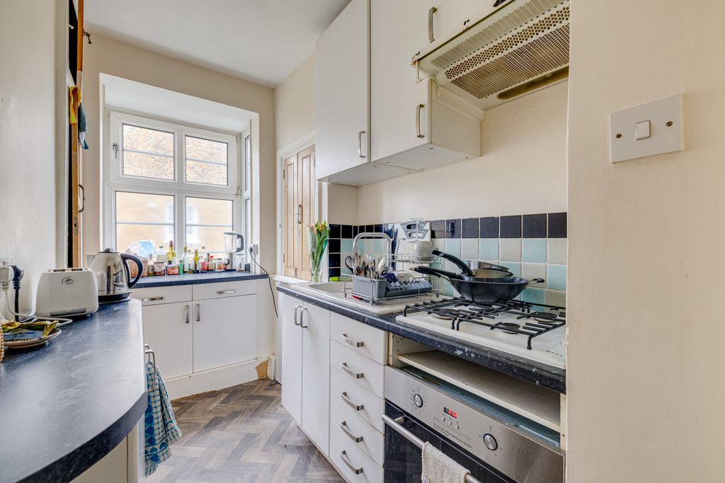 Property photo 3 of 12 Kitchen