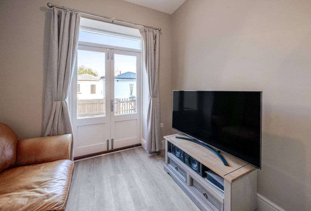 Property photo 3 of 11 Living Area