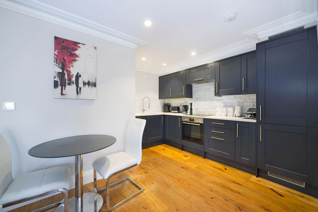 Property photo 2 of 12 Kitchen Dining Area