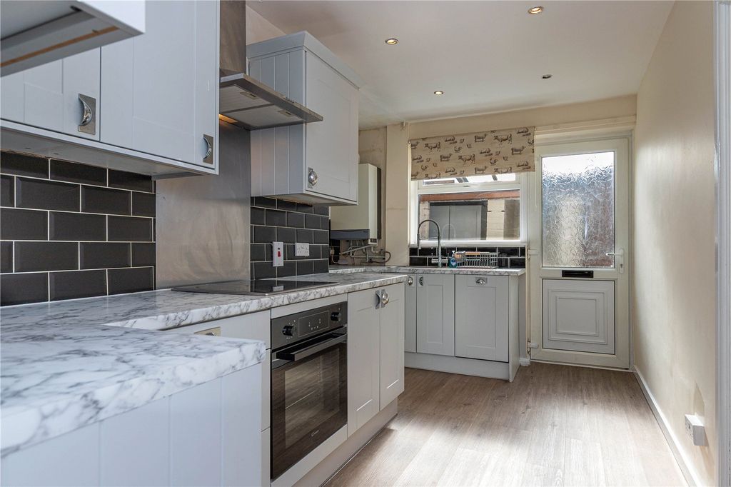 Property photo 3 of 12 Kitchen