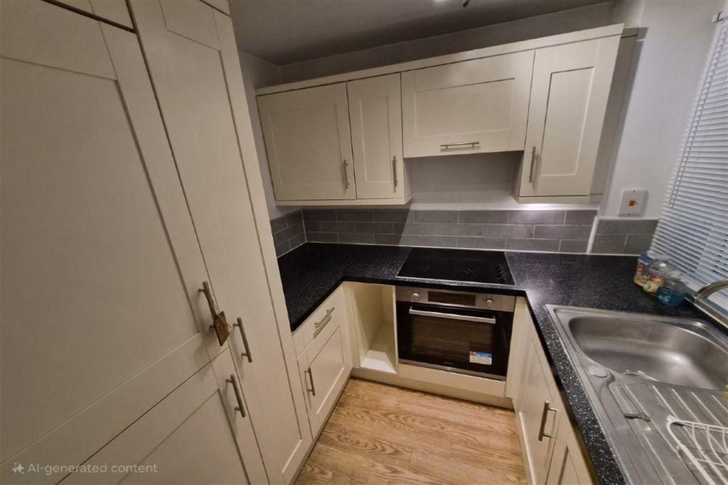 Property photo 2 of 7 Kitchen