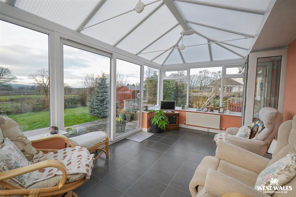 Property photo 3 of 25 Conservatory