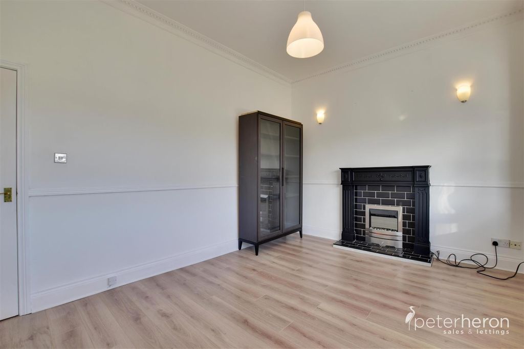 Property photo 3 of 12 Living Room