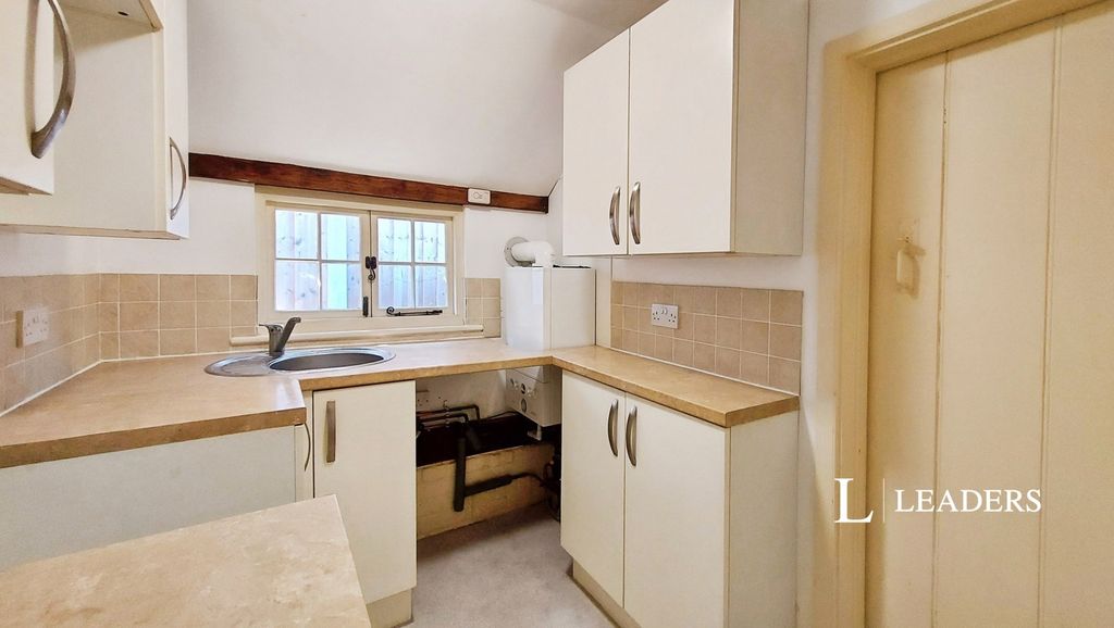 Property photo 3 of 7 Kitchen