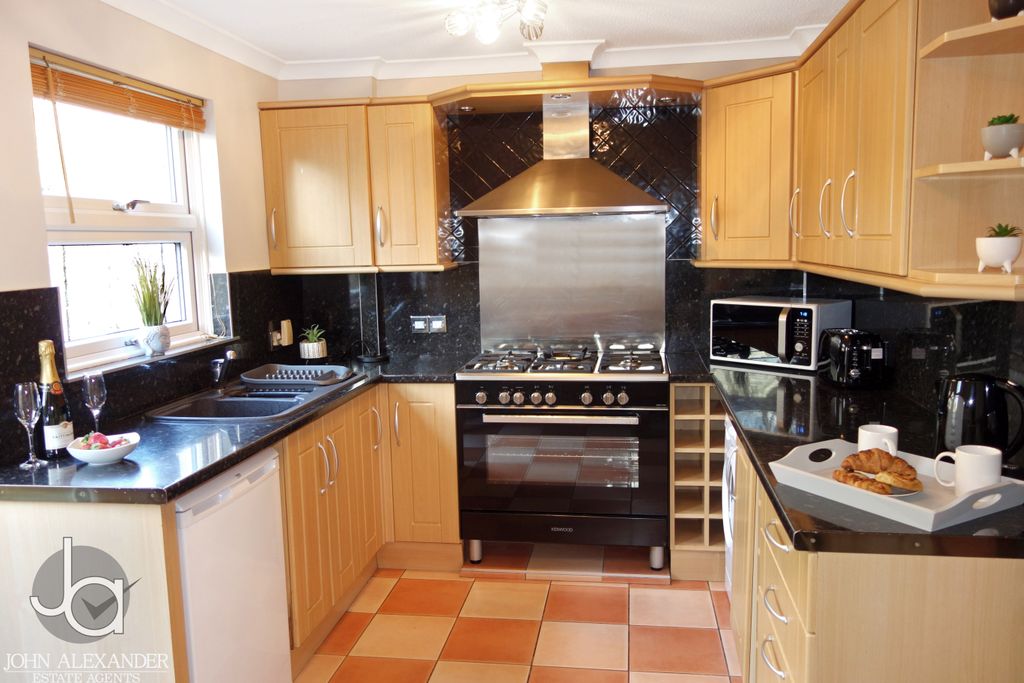 Property photo 3 of 12 8 Kitchen