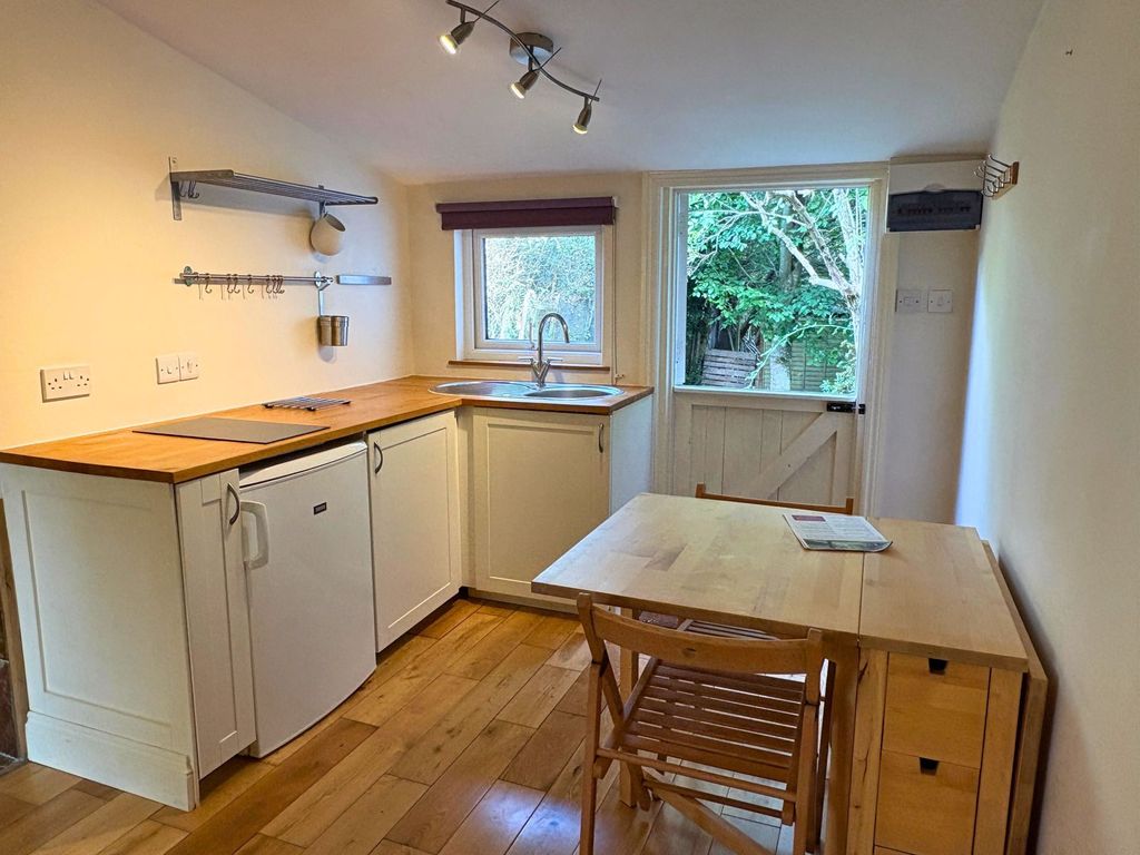 Property photo 2 of 9 Kitchen Area