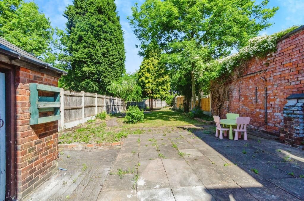 Property photo 3 of 16 Outbuilding &amp; Paved Rear Garden Area.Jpeg
