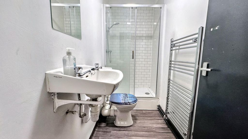 Property photo 3 of 9 Modern Bathroom With Walk-In Shower And Radiator...