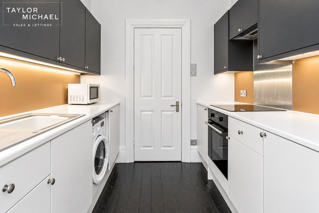 Property photo 1 of 12 Kitchen