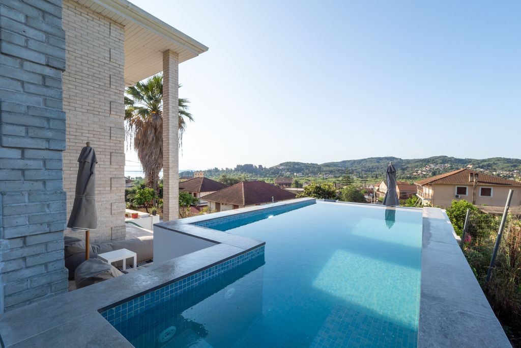 Property photo 1 of 21 Kostamaria Pool And View