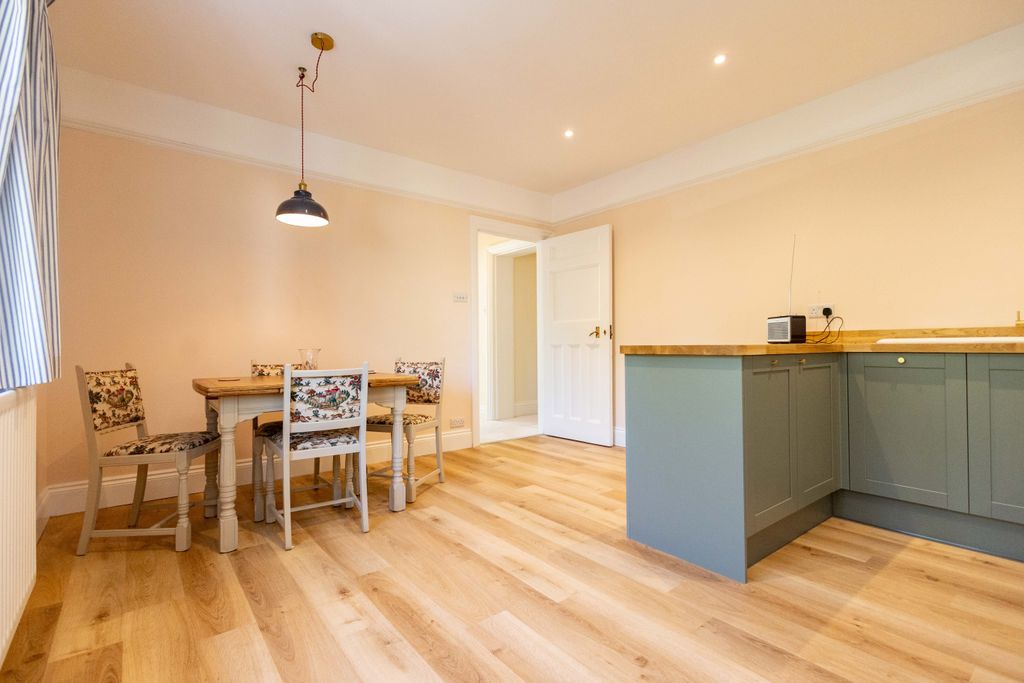 Property photo 3 of 18 Kitchen And Dining Area