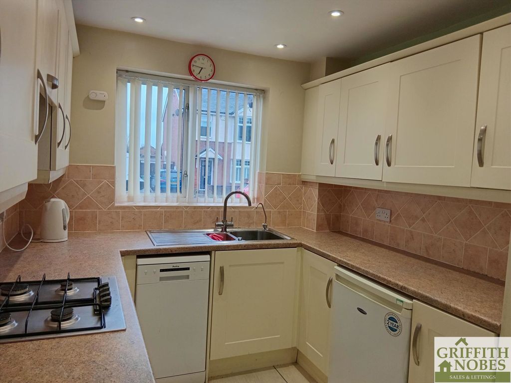 Property photo 3 of 12 Kitchen