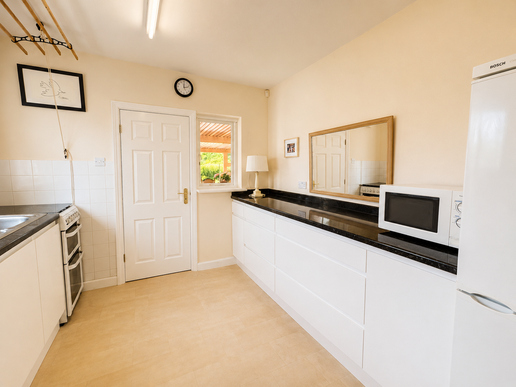 Property photo 2 of 13 Kitchen