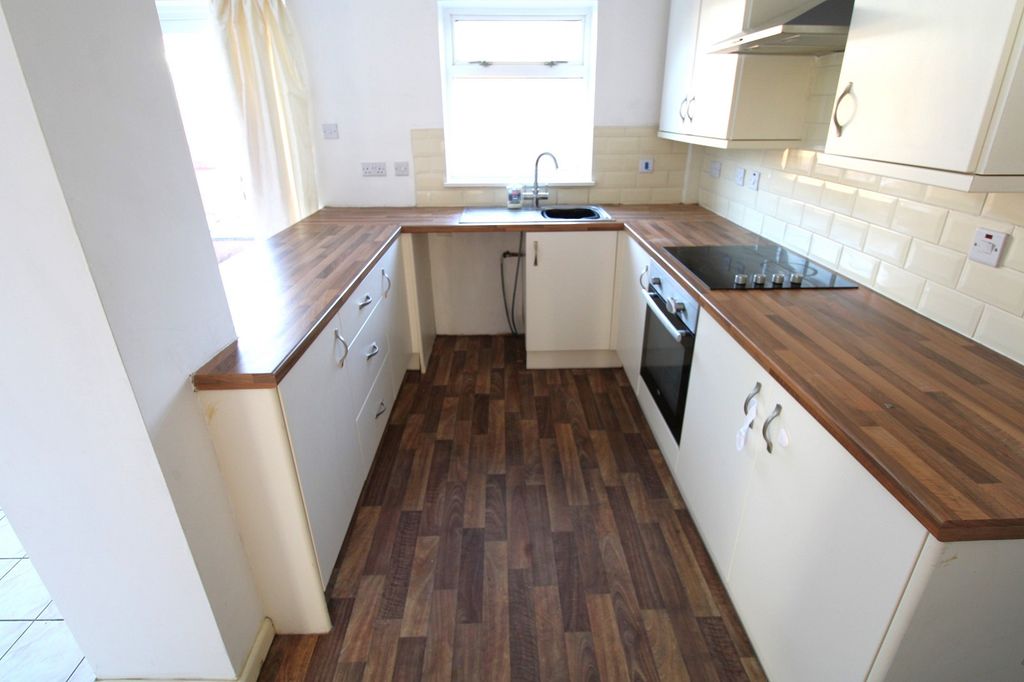 Property photo 2 of 18 Kitchen Area