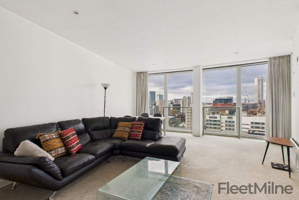 Property photo 1 of 12 Living Area