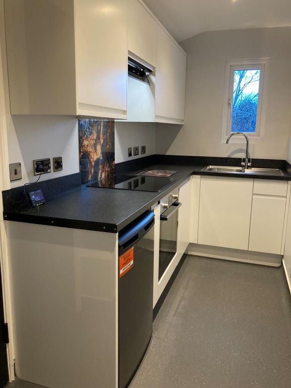 Property photo 1 of 12 Kitchen New