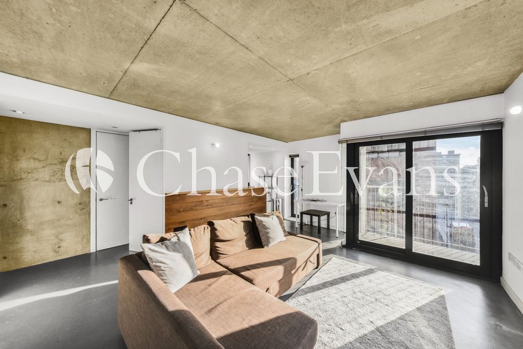 Property photo 1 of 9 Living Area