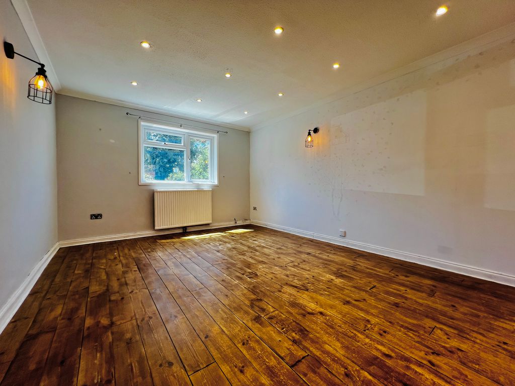Property photo 3 of 12 Living Room 1