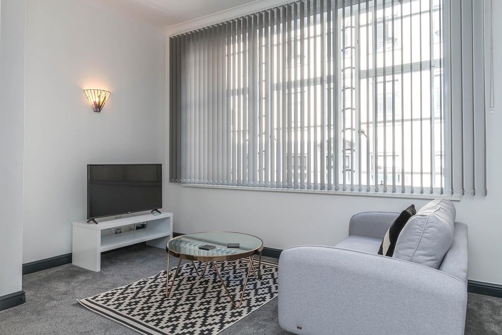 Property photo 2 of 9 Living Area