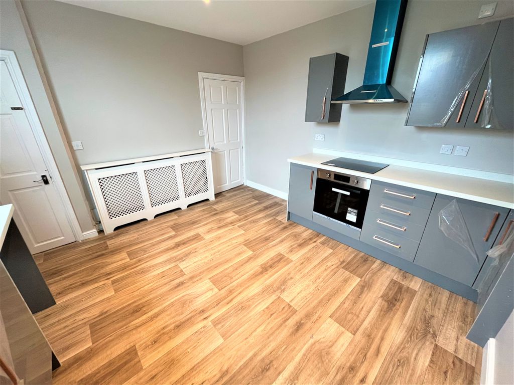 Property photo 3 of 12 Kitchen