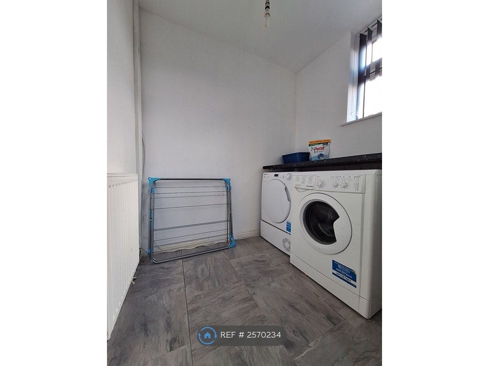 Property photo 2 of 21 Utility Room