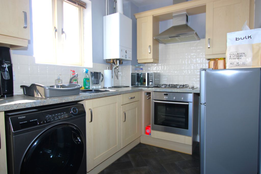Property photo 3 of 9 Kitchen Area