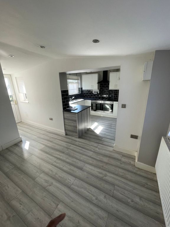 Property photo 2 of 15 Modern Open-Plan Kitchen With Sleek Wood Flooring...