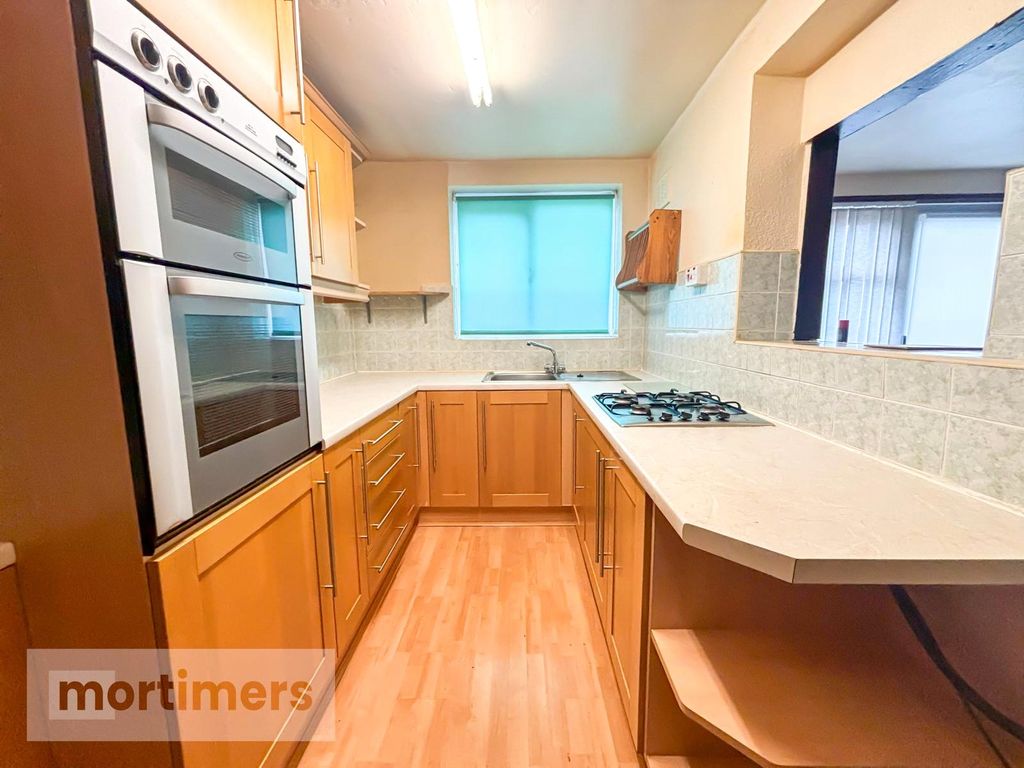 Property photo 3 of 12 Kitchen