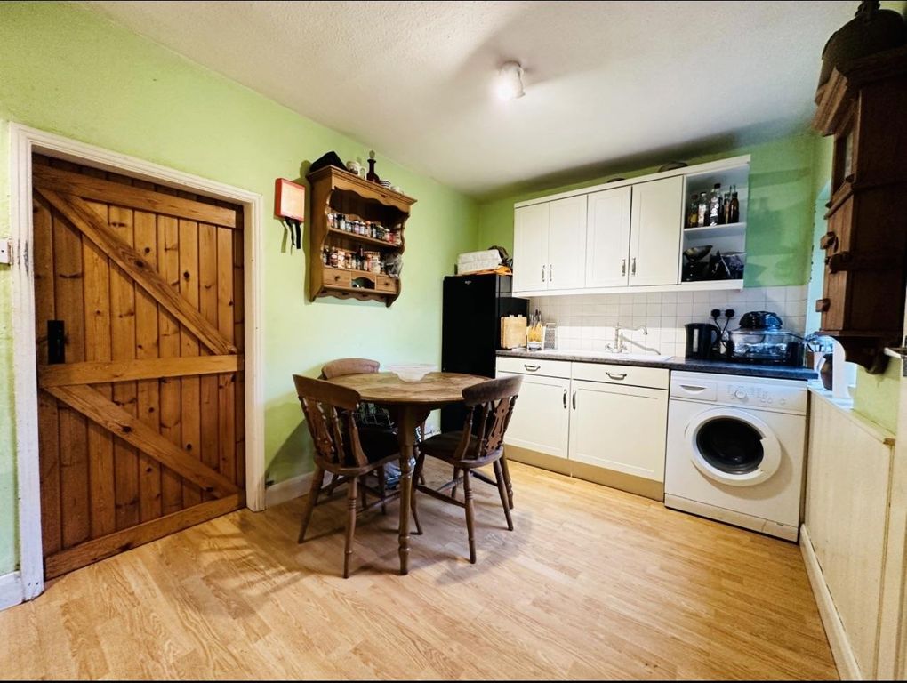 Property photo 3 of 12 Kitchen