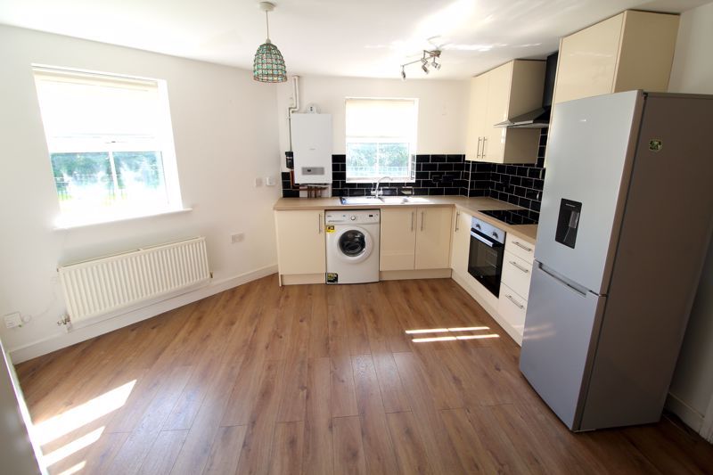 Property photo 2 of 8 Kitchen