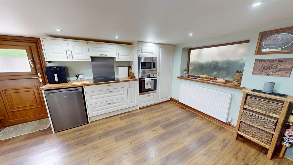 Property photo 2 of 13 Kitchen
