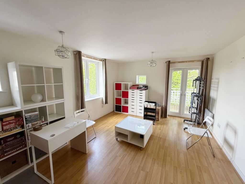 Property photo 2 of 5 Living Room With Doors To Balcony