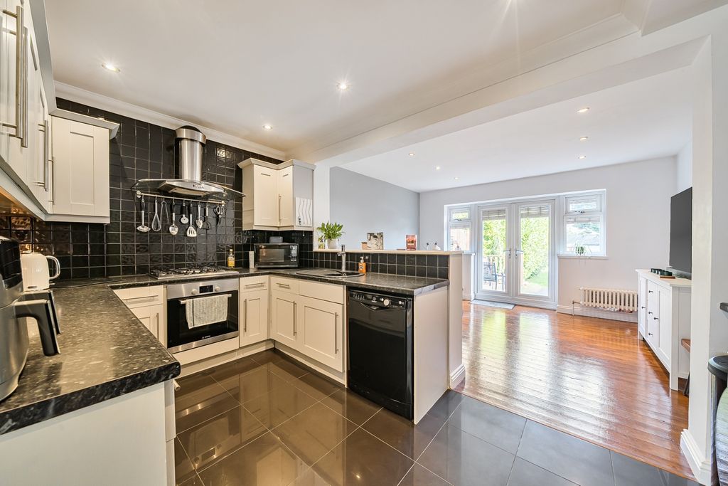 Property photo 3 of 12 Kitchen And Dining Or Seating Area