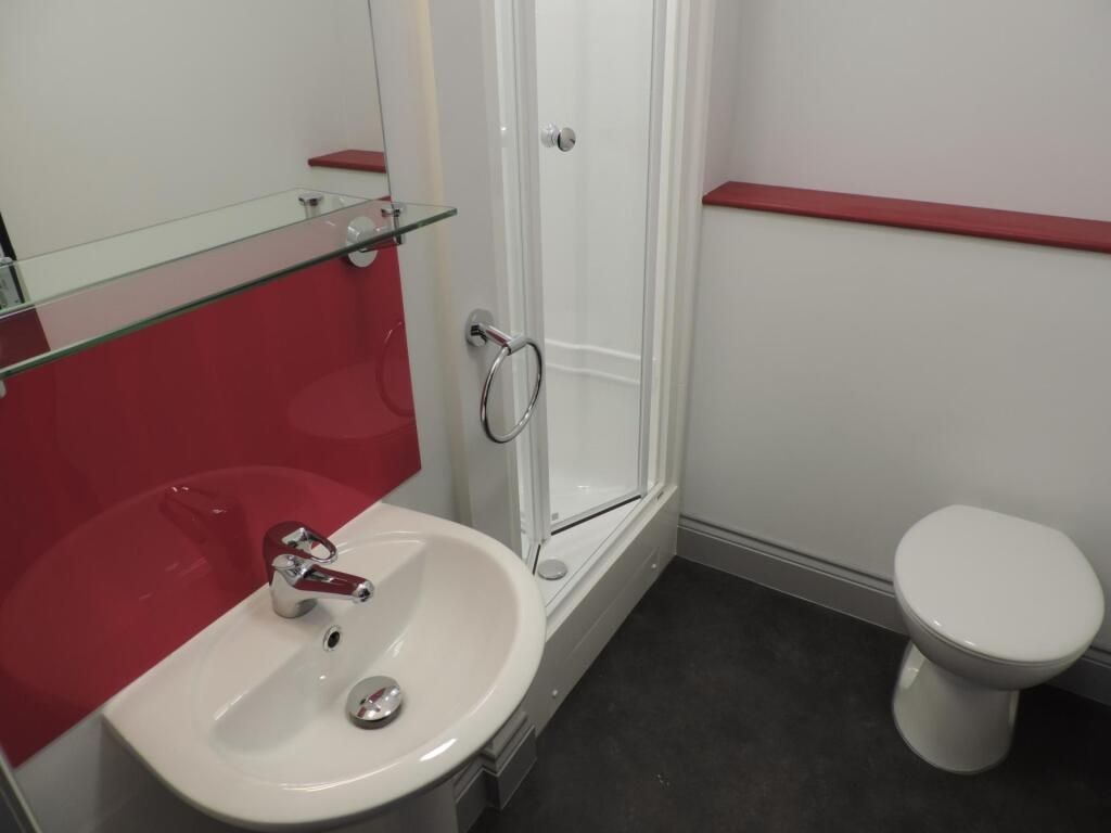Property photo 3 of 4 Modern Bathroom With Stylish Red Splashback...