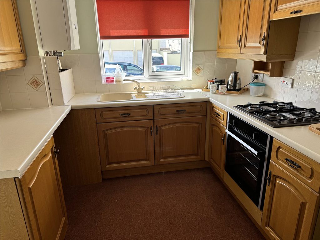 Property photo 2 of 8 Kitchen