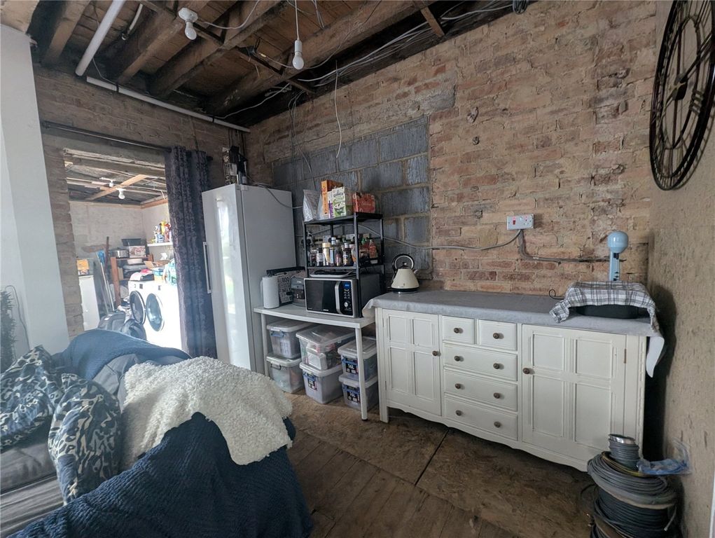 Property photo 3 of 9 Kitchen Area