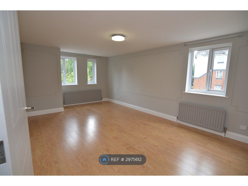Property photo 2 of 8 Living Room — Bright Dual-Aspect Living Room