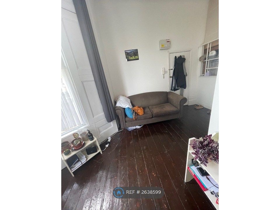 Property photo 3 of 12 Living Area