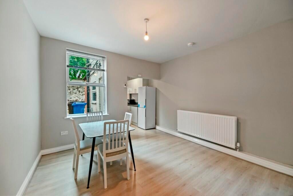 Property photo 3 of 15 Bright And Clean Kitchen Area Featuring Light Wood...
