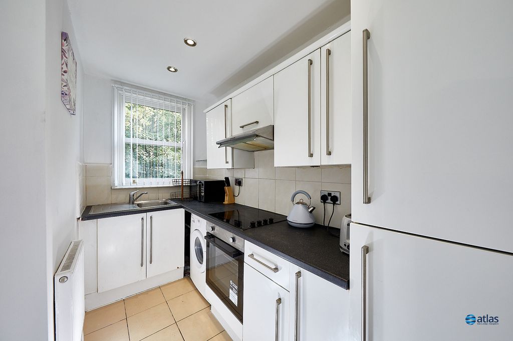 Property photo 3 of 12 Kitchen